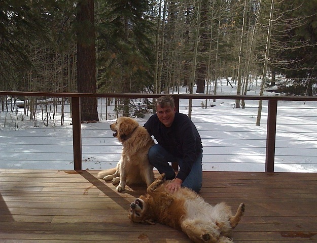 Dakota gets a tummy rub on the deck